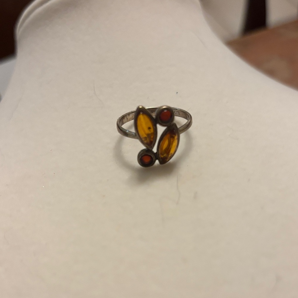 Elegant Silver Ring with Amber and Red Accents